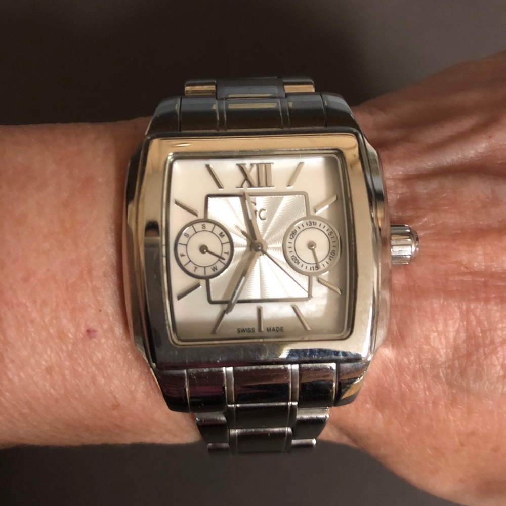 Guess Collection stainless steel watch.